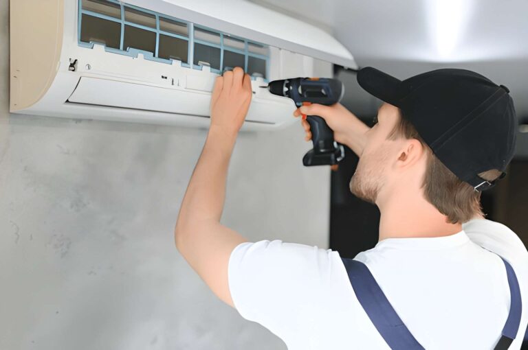 Professional AC repair technician in Dubai offering expert coil cleaning service in Al Barsha